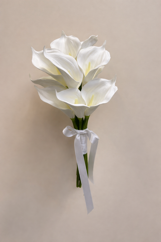 White calla lily artificial bridesmaid bouquet tied with a white satin ribbon
