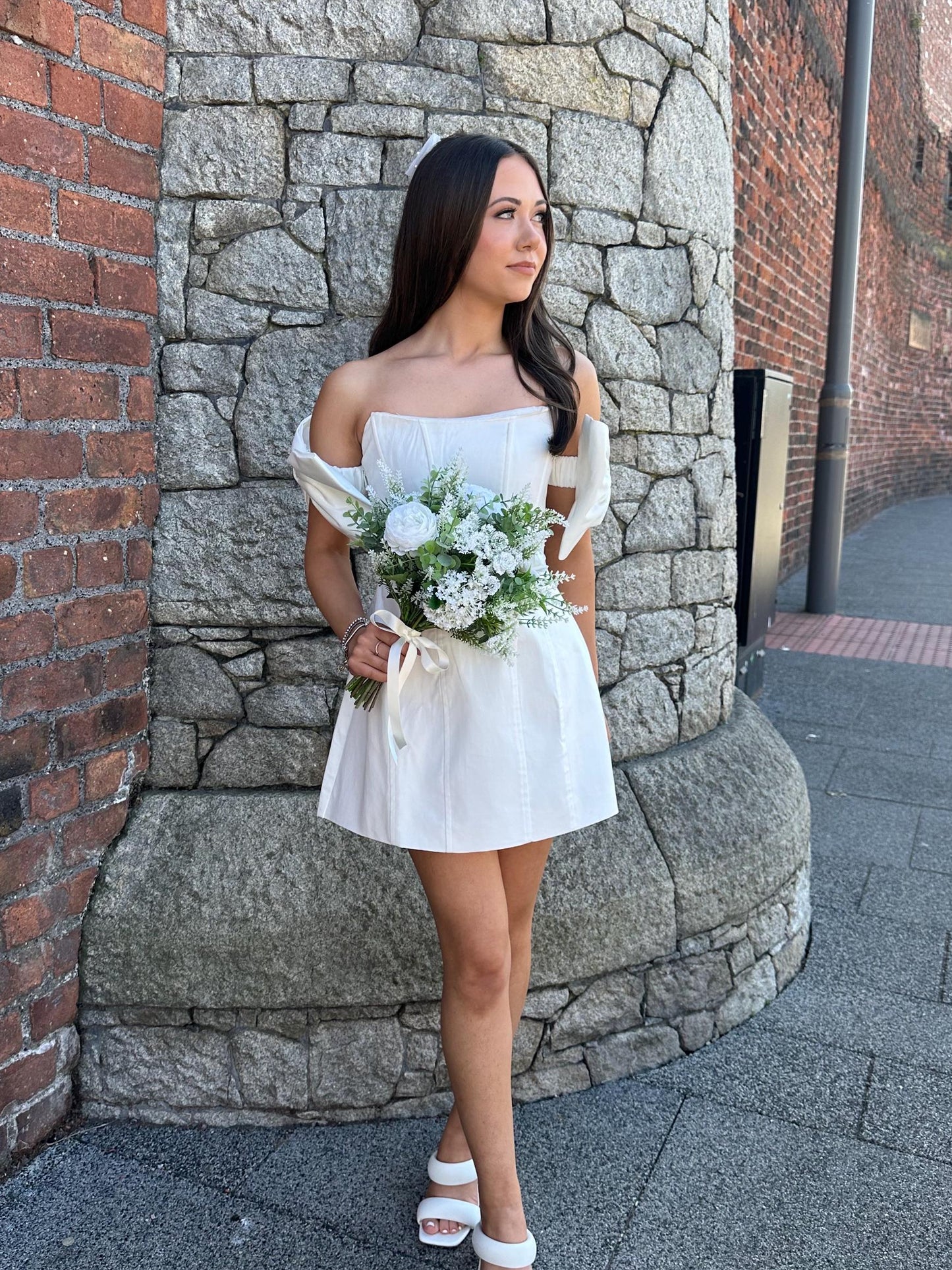 artificial green and white bridal bouquet